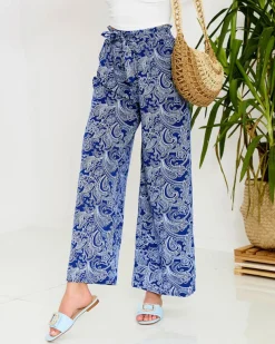 Royalfashion Granatowe damskie spodnie materiałowe z printem