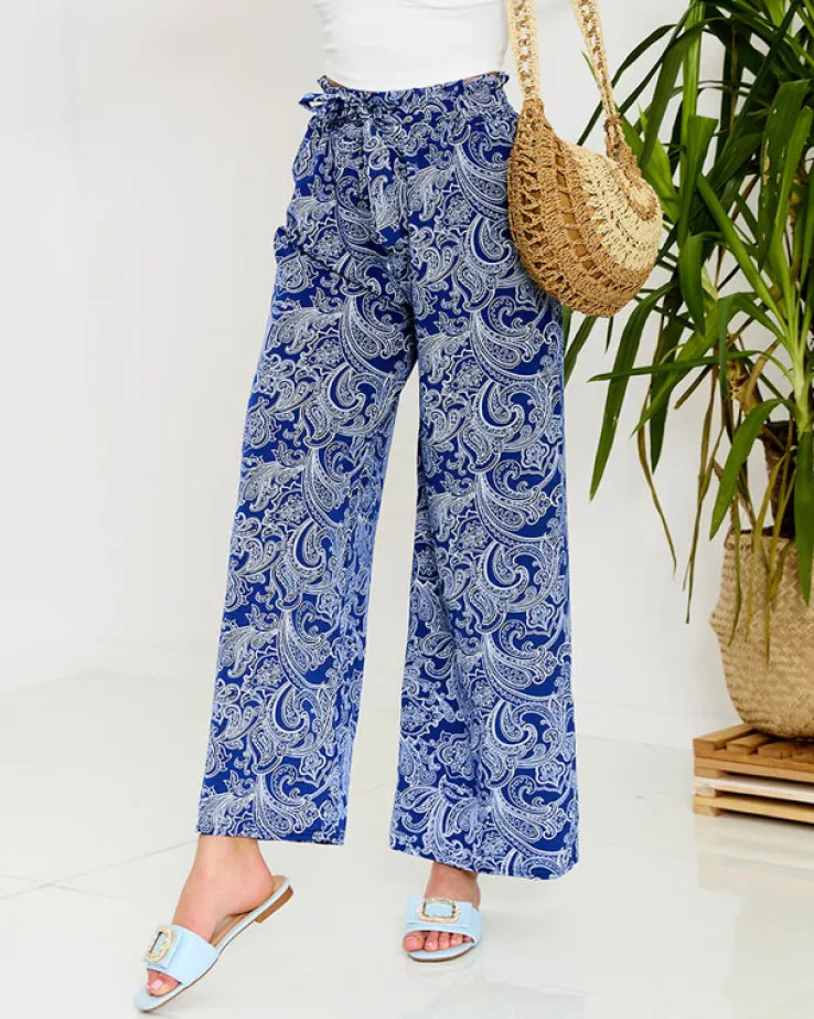 Royalfashion Granatowe damskie spodnie materiałowe z printem