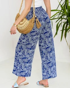 Royalfashion Granatowe damskie spodnie materiałowe z printem