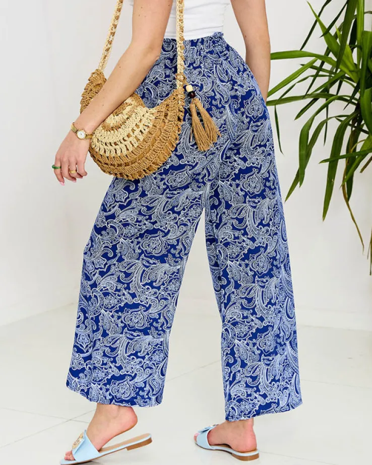 Royalfashion Granatowe damskie spodnie materiałowe z printem