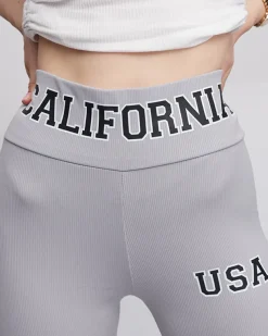 Royalfashion Jasnoszare damskie prążkowane legginsy z napisami