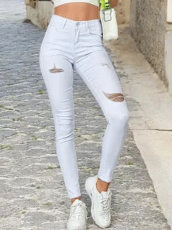 Royalfashion Jeansy damskie typu rurki z przetarciami