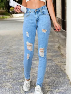 Royalfashion Jeansy damskie typu rurki z przetarciami 5717-6