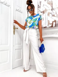Royalfashion Kombinezon damski z szerokimi spodniami i wzorzystą bluzką z krótkim rękawem