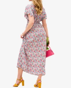 Royalfashion Kwiecista beżowa damska sukienka midi z kopertowym dekoltem