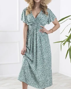 Royalfashion Kwiecista ciemnozielona damska sukienka z kopertowym dekoltem