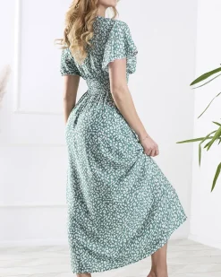 Royalfashion Kwiecista ciemnozielona damska sukienka z kopertowym dekoltem