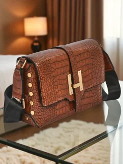 Royalfashion Lakierowana mała damska torebka z eko skóry Velia Crest