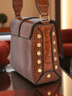 Royalfashion Lakierowana mała damska torebka z eko skóry Velia Crest