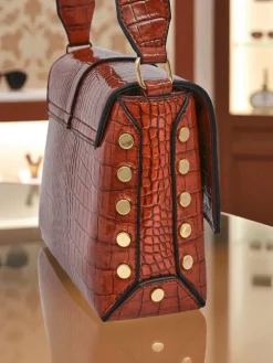 Royalfashion Lakierowana mała damska torebka z eko skóry Velia Crest