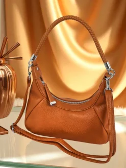 Royalfashion Mała damska torebka z eko skóry z ozdobnym paseczkiem Lacquea