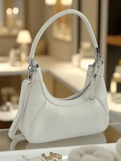 Royalfashion Mała damska torebka z eko skóry z ozdobnym paseczkiem Lacquea