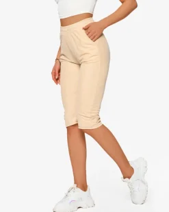 Royalfashion Materiałowe spodenki damskie 3/4 w kolorze beżowym PLUS SIZE