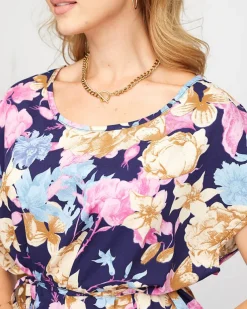 Royalfashion Prosta damska granatowa sukienka z wiązaniem w talii i roślinnym wzorem