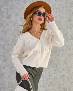 Royalfashion Rozpinany damski sweter z kokardkami