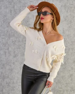 Royalfashion Rozpinany damski sweter z kokardkami