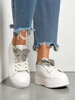 Royalfashion Sneakersy damskie na platformie z motylkiem Obellay