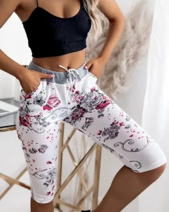 Royalfashion Spodenki damskie biało- różowe o długości 3/4