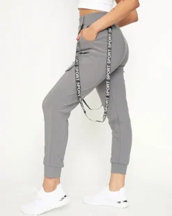 Royalfashion Szare damskie materiałowe spodnie typu bojówki z szelkami