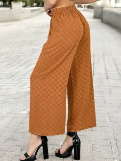 Royalfashion Szerokie spodnie damskie w kratę