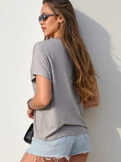 Royalfashion Wiskozowa bluzka damska z krótkim rękawem i brokatowym wykończeniem