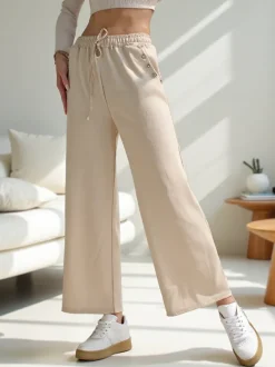 Royalfashion Wiskozowe szerokie spodnie damskie dresowe z cyrkoniami