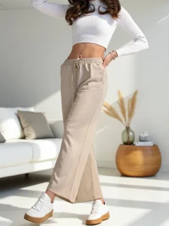 Royalfashion Wiskozowe szerokie spodnie damskie dresowe z cyrkoniami