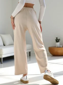 Royalfashion Wiskozowe szerokie spodnie damskie dresowe z cyrkoniami