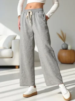 Royalfashion Wiskozowe szerokie spodnie damskie dresowe z cyrkoniami