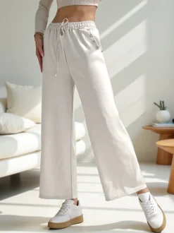 Royalfashion Wiskozowe szerokie spodnie damskie dresowe z cyrkoniami