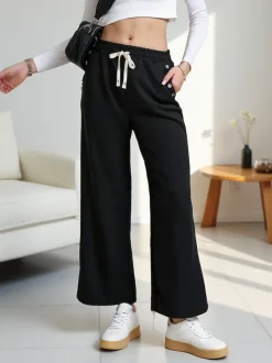 Royalfashion Wiskozowe szerokie spodnie damskie dresowe z cyrkoniami