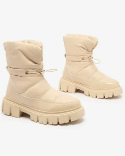 Royalfashion Wsuwane śniegowce damskie w beżowym kolorze Sadella