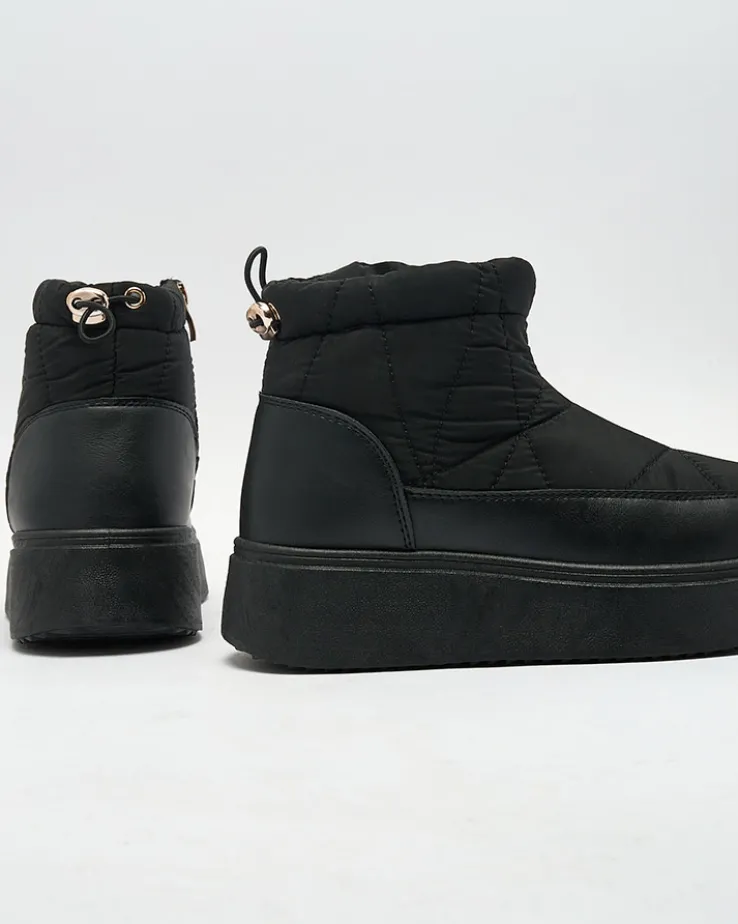 Royalfashion Wsuwane śniegowce damskie w czarnym kolorze Armeda