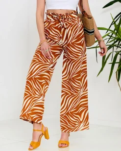 Royalfashion Wzorzyste spodnie damskie typu palazzo w kolorze camelowym