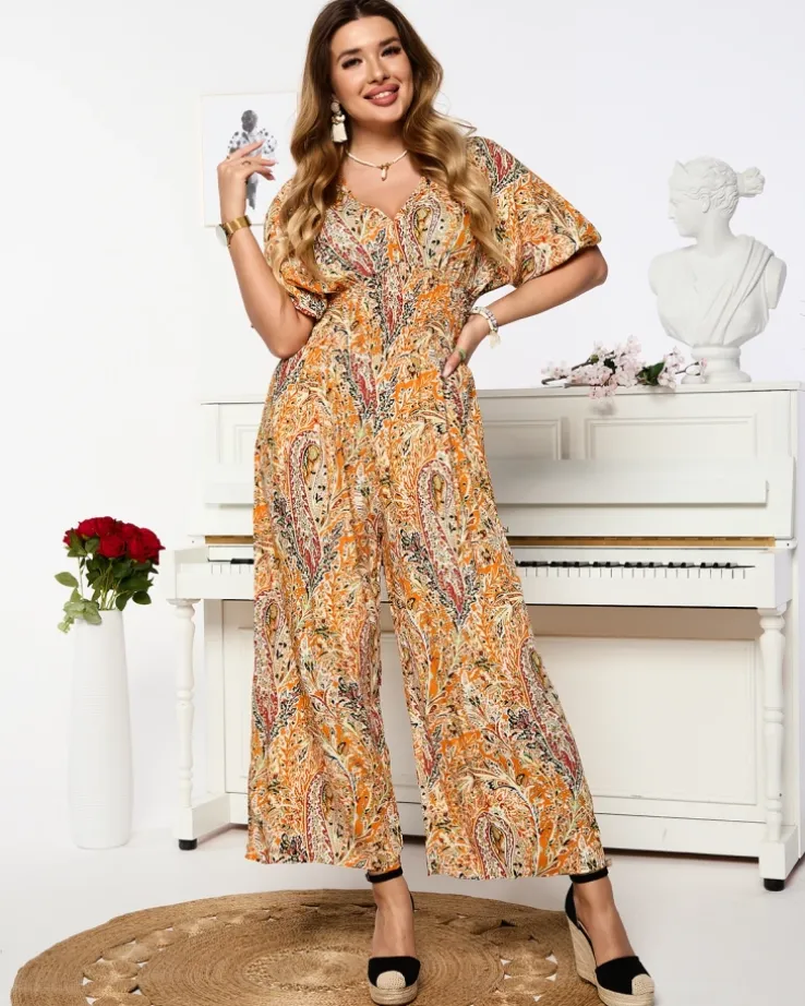 Royalfashion Wzorzysty kombinezon damski w kolorze pomarańczowym