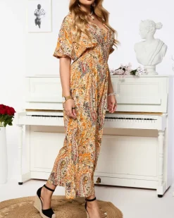 Royalfashion Wzorzysty kombinezon damski w kolorze pomarańczowym