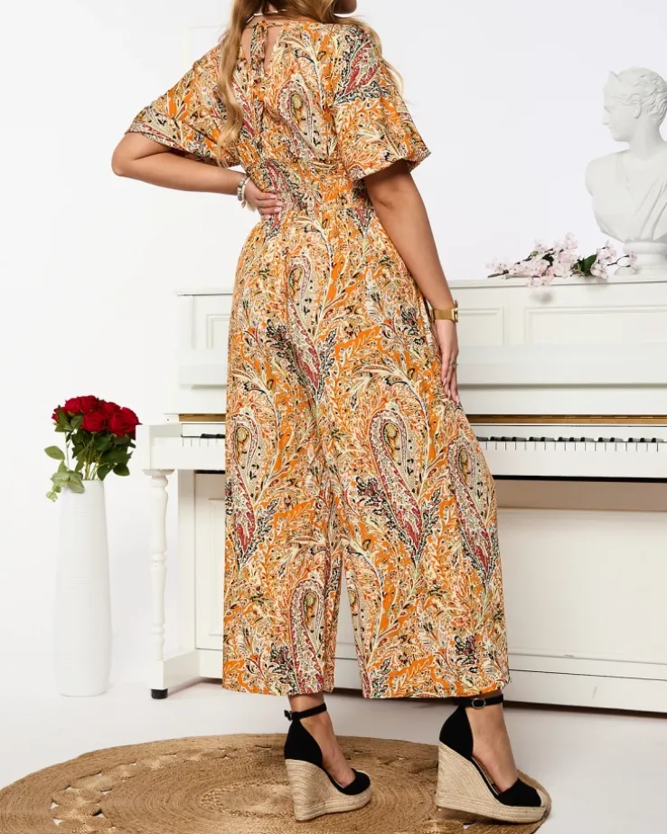 Royalfashion Wzorzysty kombinezon damski w kolorze pomarańczowym