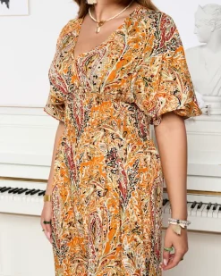 Royalfashion Wzorzysty kombinezon damski w kolorze pomarańczowym
