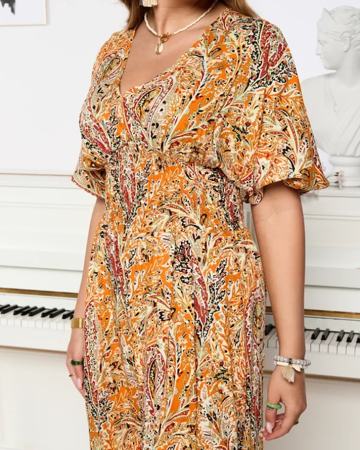 Royalfashion Wzorzysty kombinezon damski w kolorze pomarańczowym