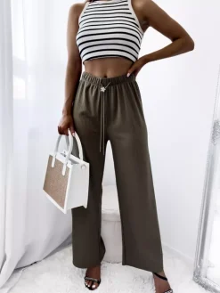 Royalfashion Zielone damskie szerokie spodnie prążkowane