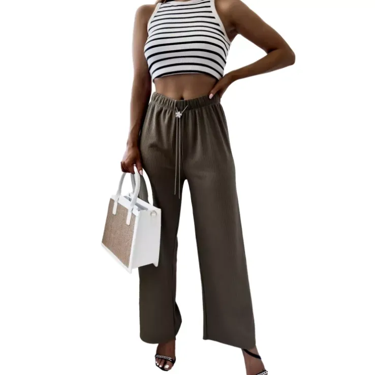 Royalfashion Zielone damskie szerokie spodnie prążkowane