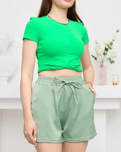 Royalfashion Zielone damskie satynowe krótkie spodenki z kieszeniami