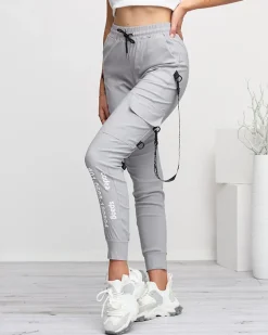 Szare damskie spodnie typu bojówki z napisami - Odzież