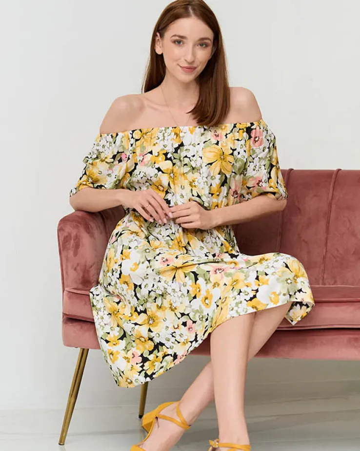 Żółta sukienka do kolana w różnobarwny kwiatowy wzór- Odzież