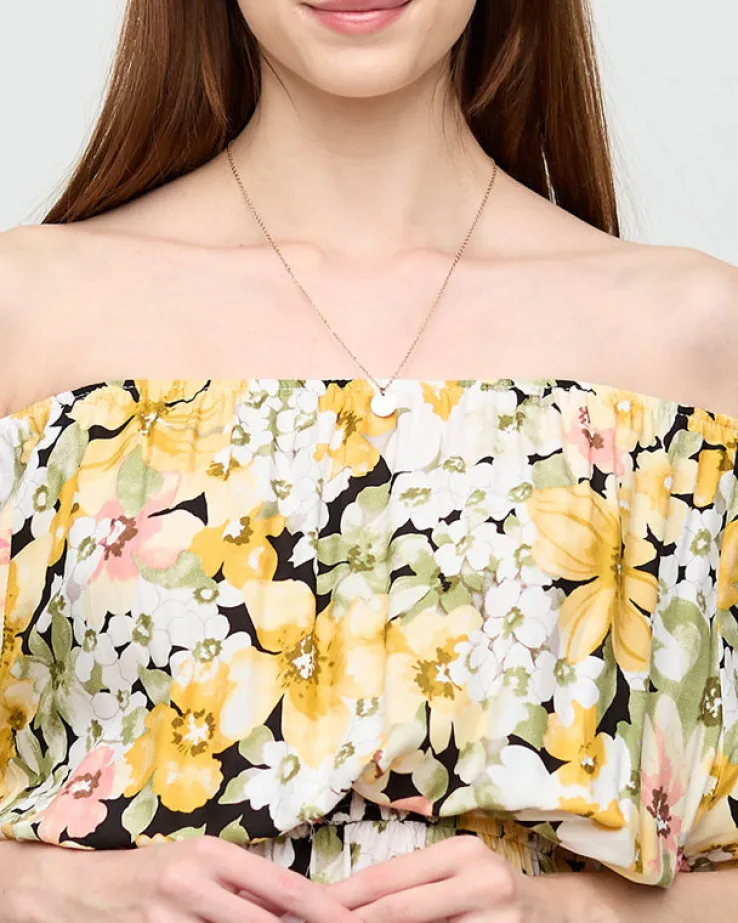 Żółta sukienka do kolana w różnobarwny kwiatowy wzór- Odzież